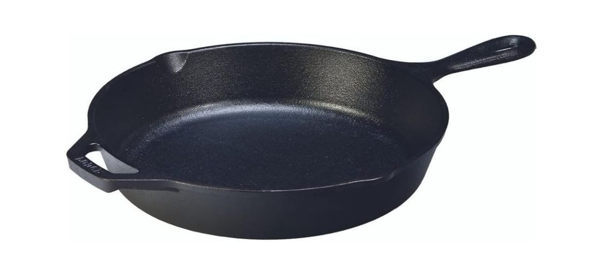 Lodge 10.25-Inch Cast Iron Skillet on white background with teardrop handle Lodge 10.25-Inch Cast Iron Skillet on white background with teardrop handle