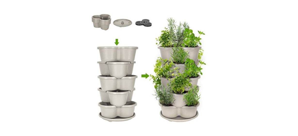 2 stacks of plastic, off-white pots, one stack with herbs growing in it