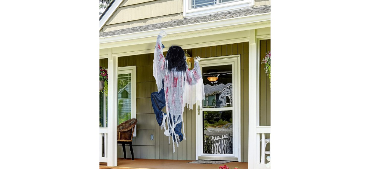 JOYIN 47 Halloween Climbing Zombie Decoration on outside of house