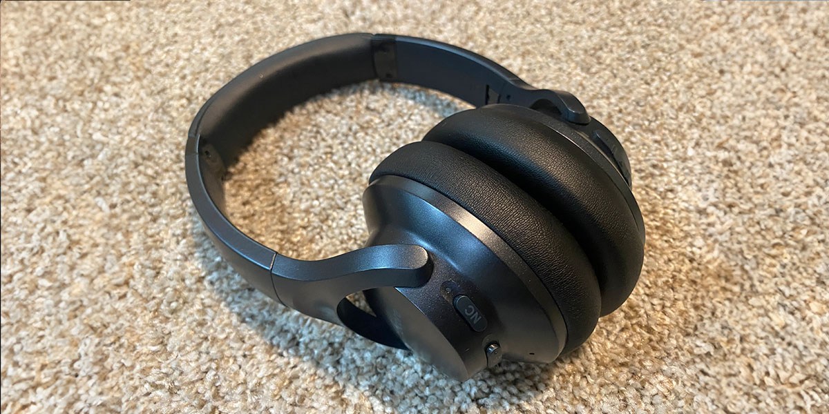 Black Soundcore by Anker Space One headphones on carpet